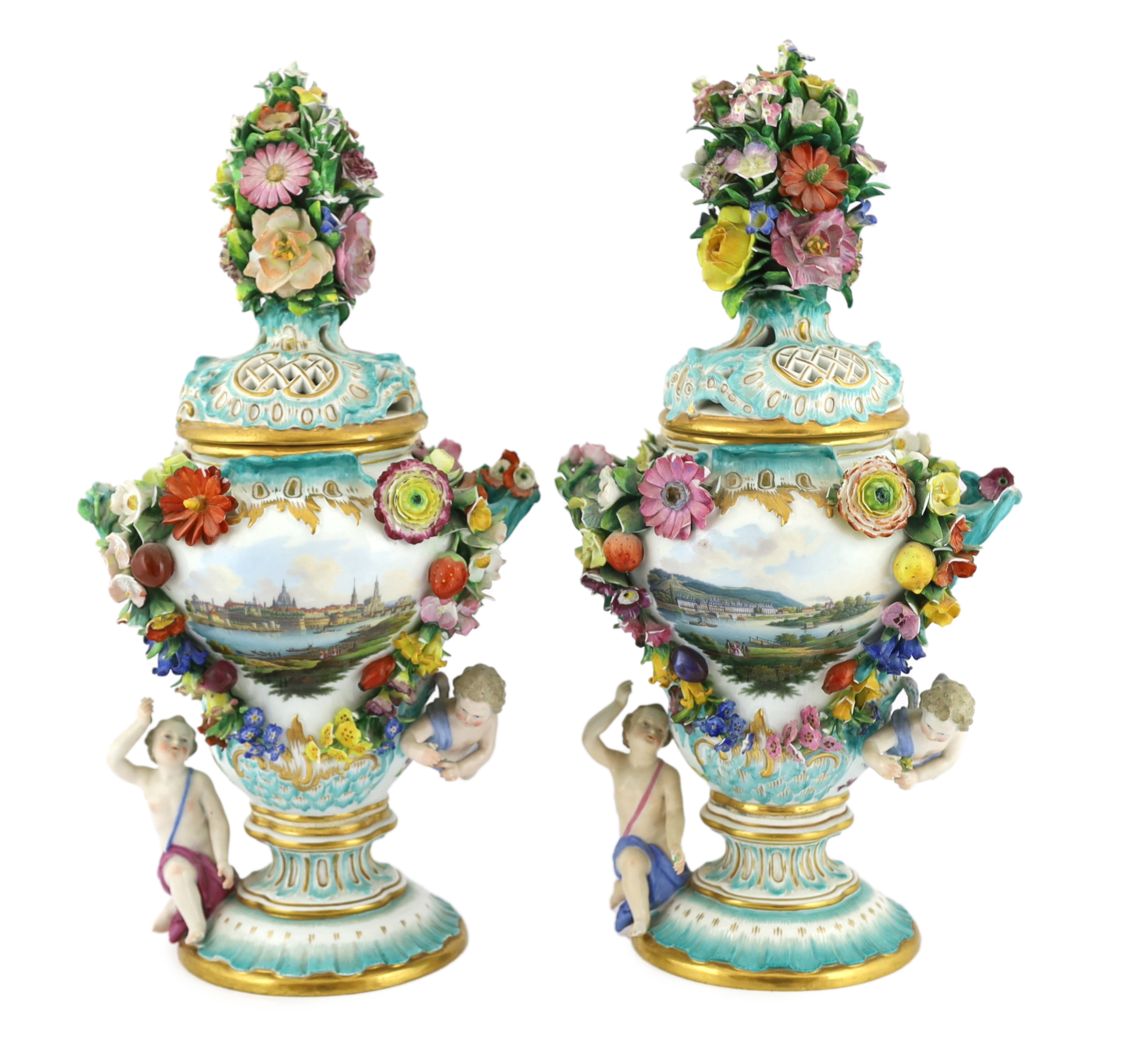 A pair of Meissen topographical flower encrusted vases and covers, 19th century, losses